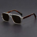 Model wearing oversized aviator sunglasses, side profile shot