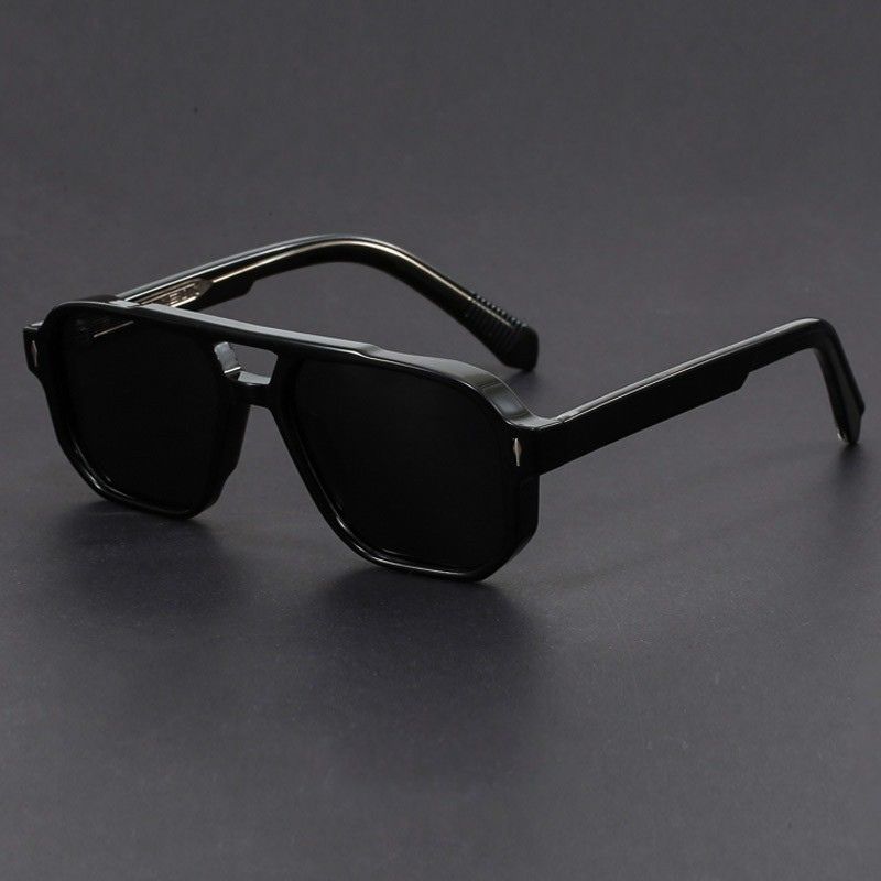 Overhead flat lay of aviator sunglasses showing frame width and shape