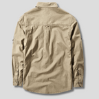 Model wearing canvas utility shirt in neutral pose