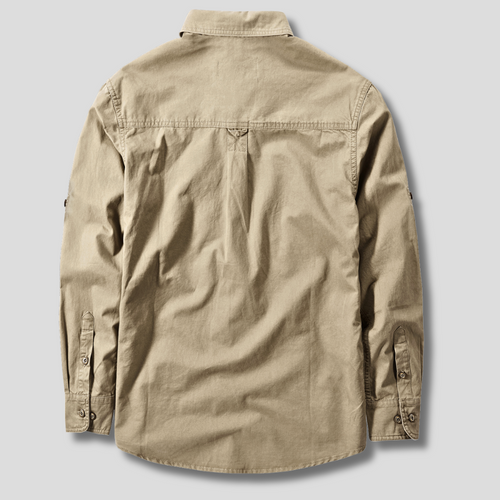 Model wearing canvas utility shirt in neutral pose