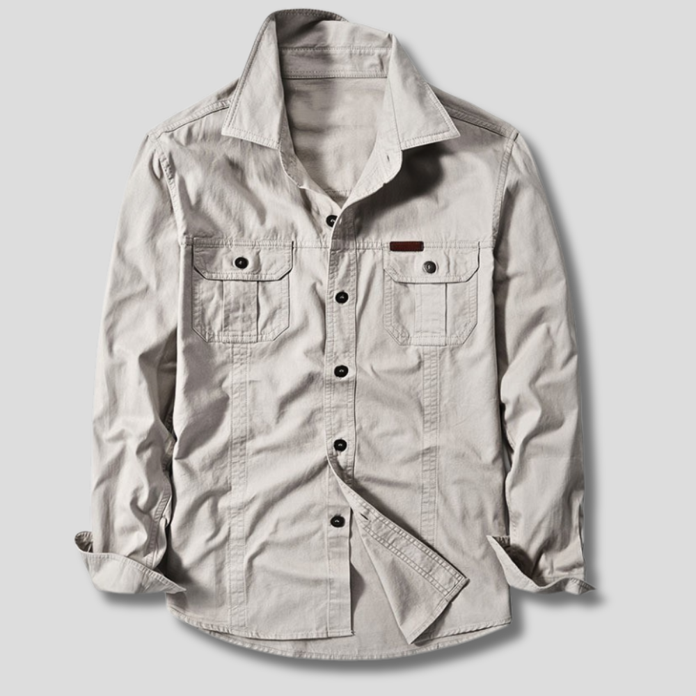 Back view of canvas utility shirt on model