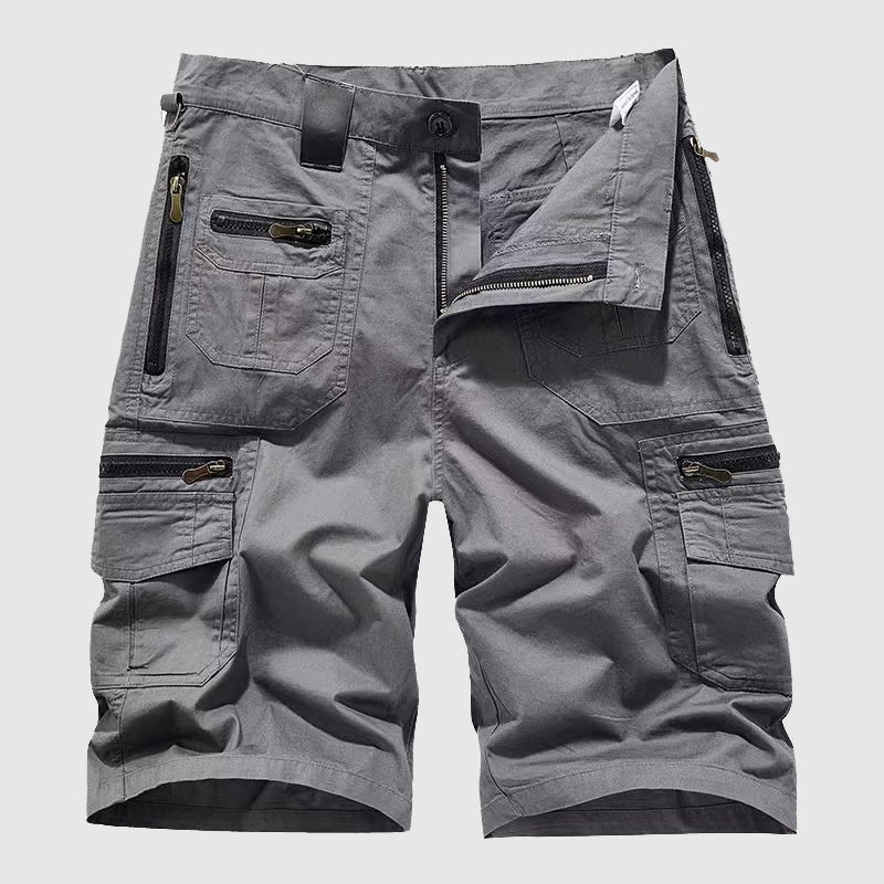 Close-up detail of zipper pocket on cargo shorts leg