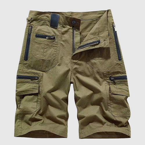 Model wearing cargo shorts, standing pose showcasing fit and length