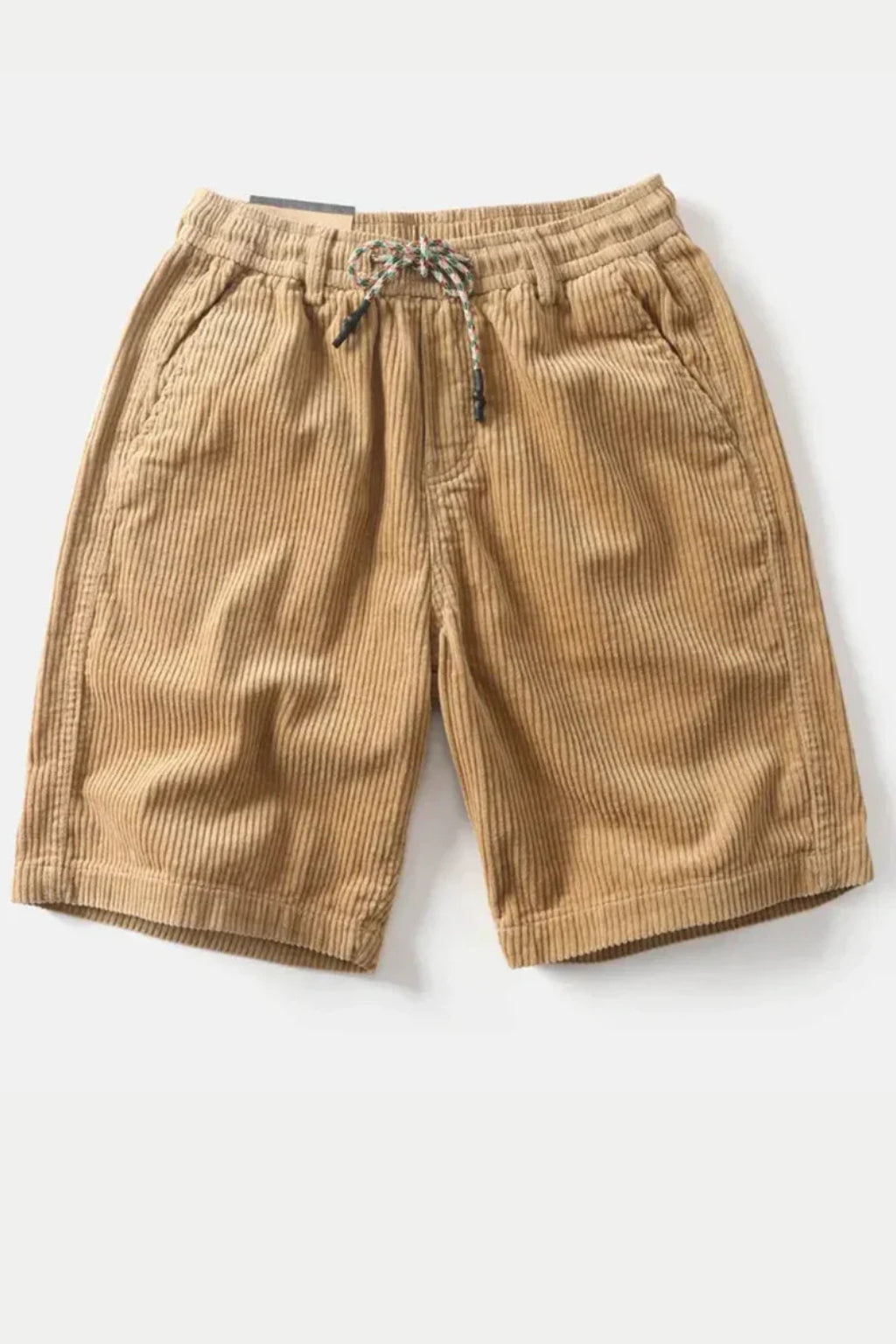 Model wearing corduroy shorts, standing pose