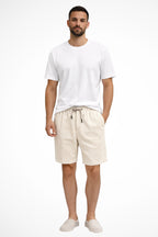 Back view of corduroy shorts on model