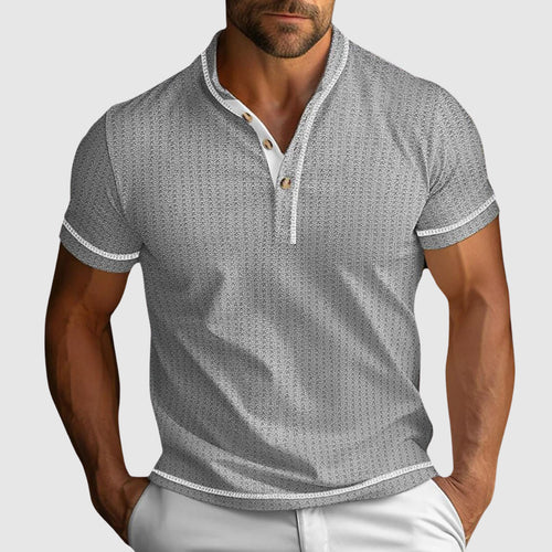 Model wearing henley shirt in relaxed standing pose