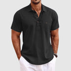 Model wearing linen polo shirt, standing straight-on pose