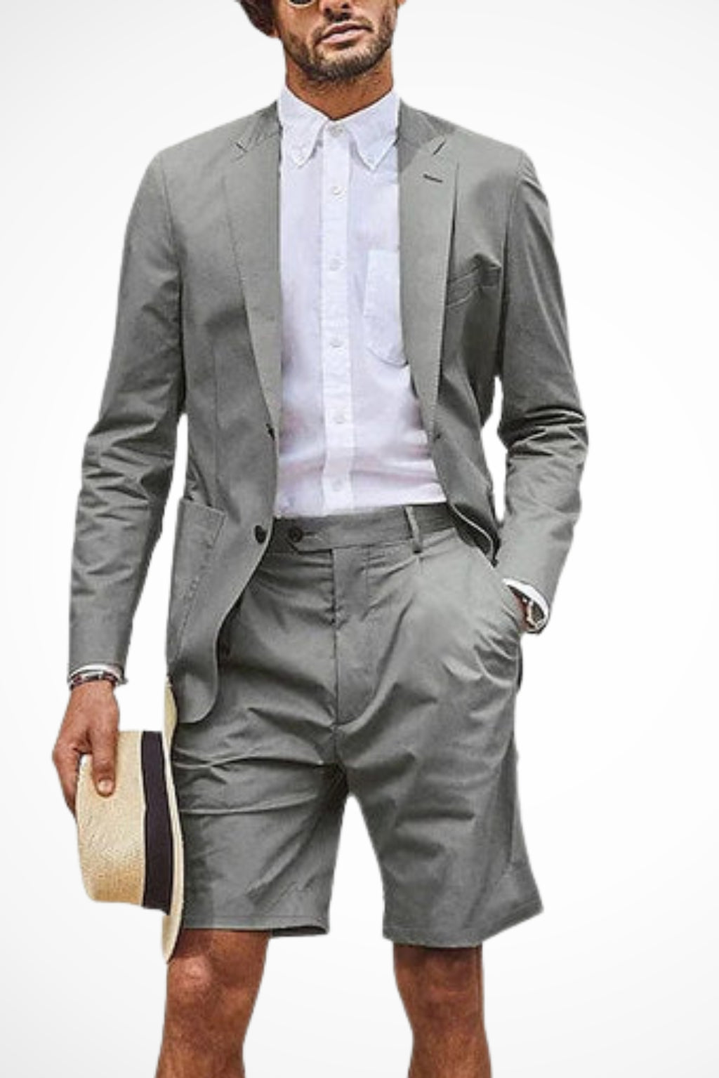 Model wearing grey blazer shorts suit, front-facing pose
