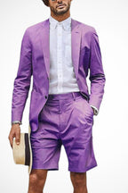 Model in grey short suit, side profile showing tailored fit