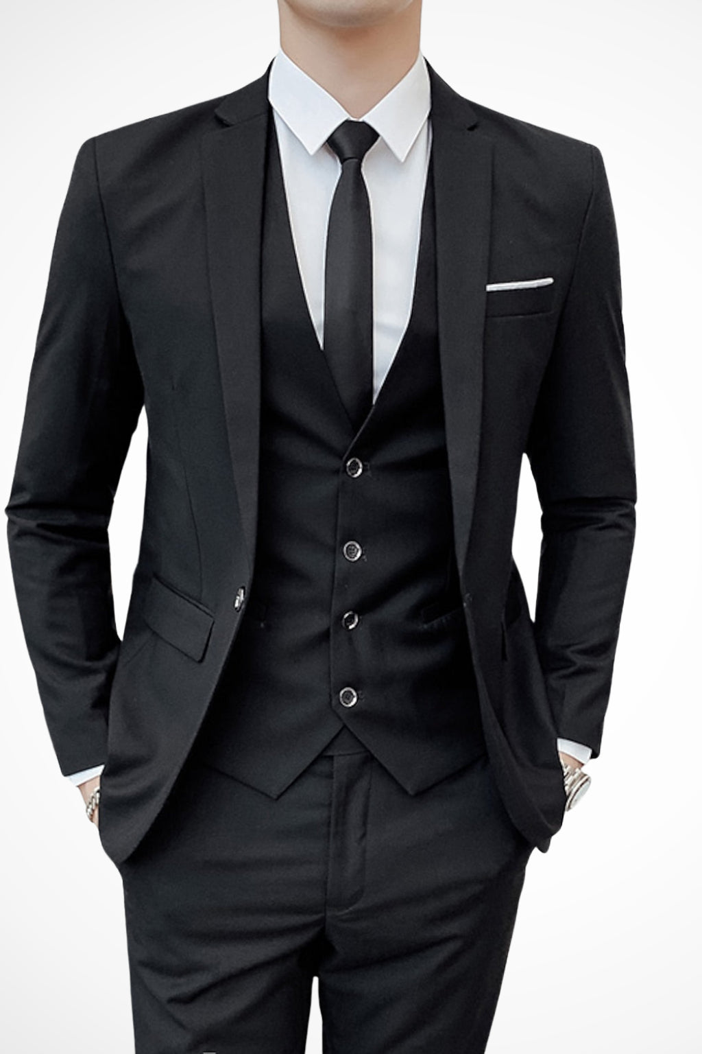 Man wearing completed three-piece suit for formal occasion styling