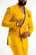 Peak lapel and shoulder detail on tailored blazer
