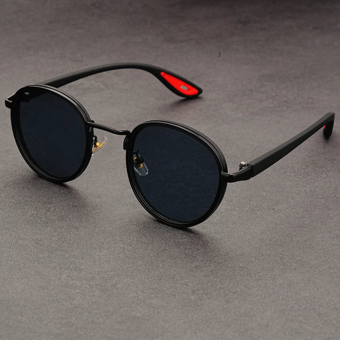 Model wearing sunglasses in casual outdoor environment