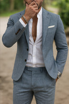 Close-up of notch lapel and three-button fastening detail