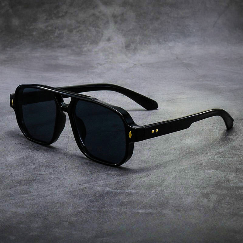 Model wearing oversized square sunglasses, three-quarter angle shot