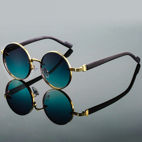 Men's round sunglasses with gold metal frame and gradient teal lenses, front view