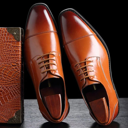 Men's black leather oxford shoe with lace-up fastening, front three-quarter view