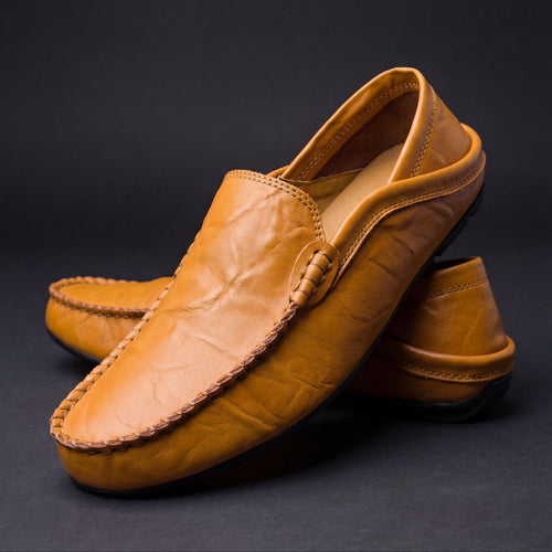 Men's leather slip on loafer, side view on white background