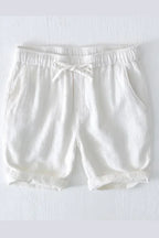 Close-up of pocket detail on shorts