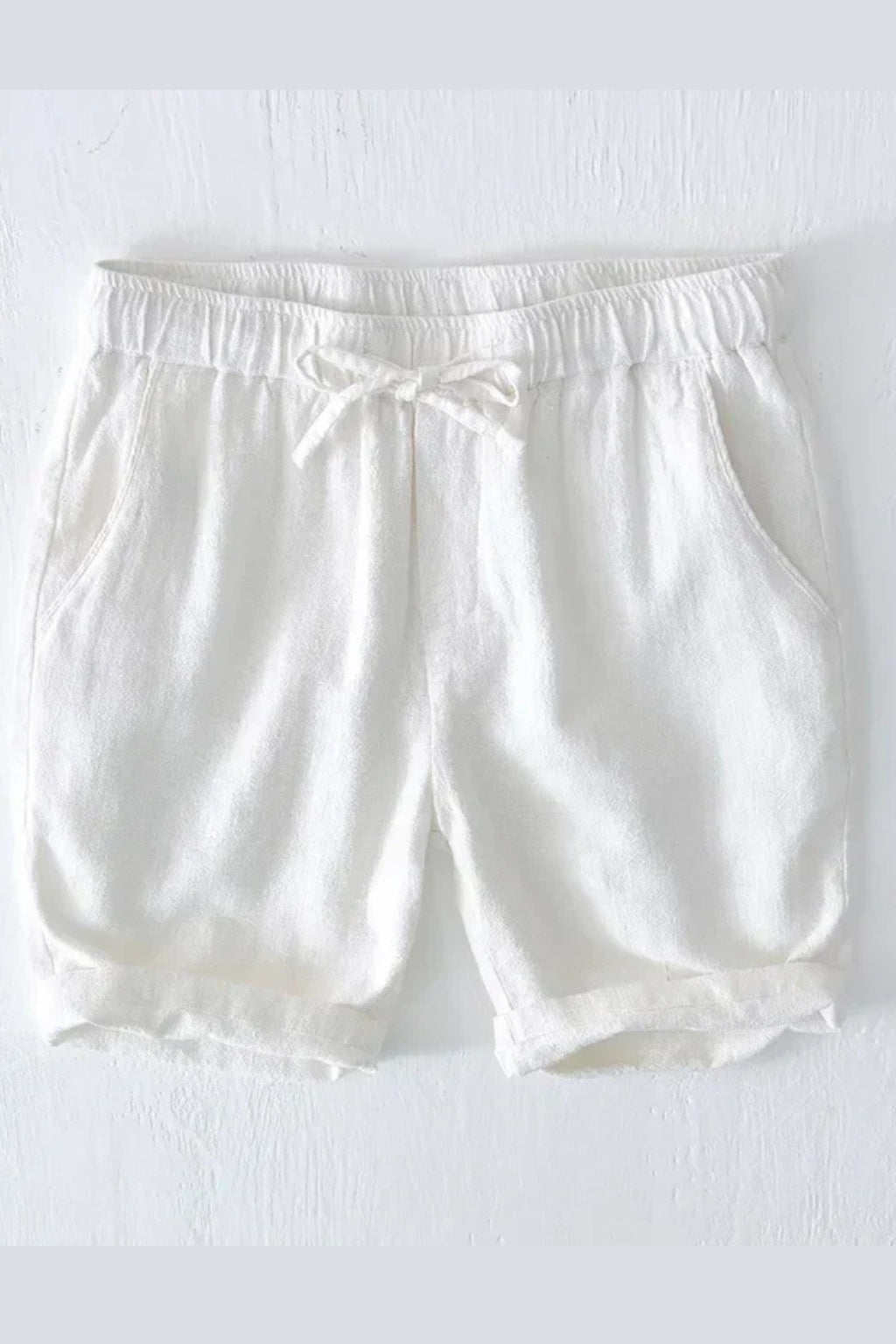 Close-up of pocket detail on shorts