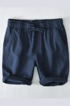 Model wearing shorts with casual styling, lifestyle shot