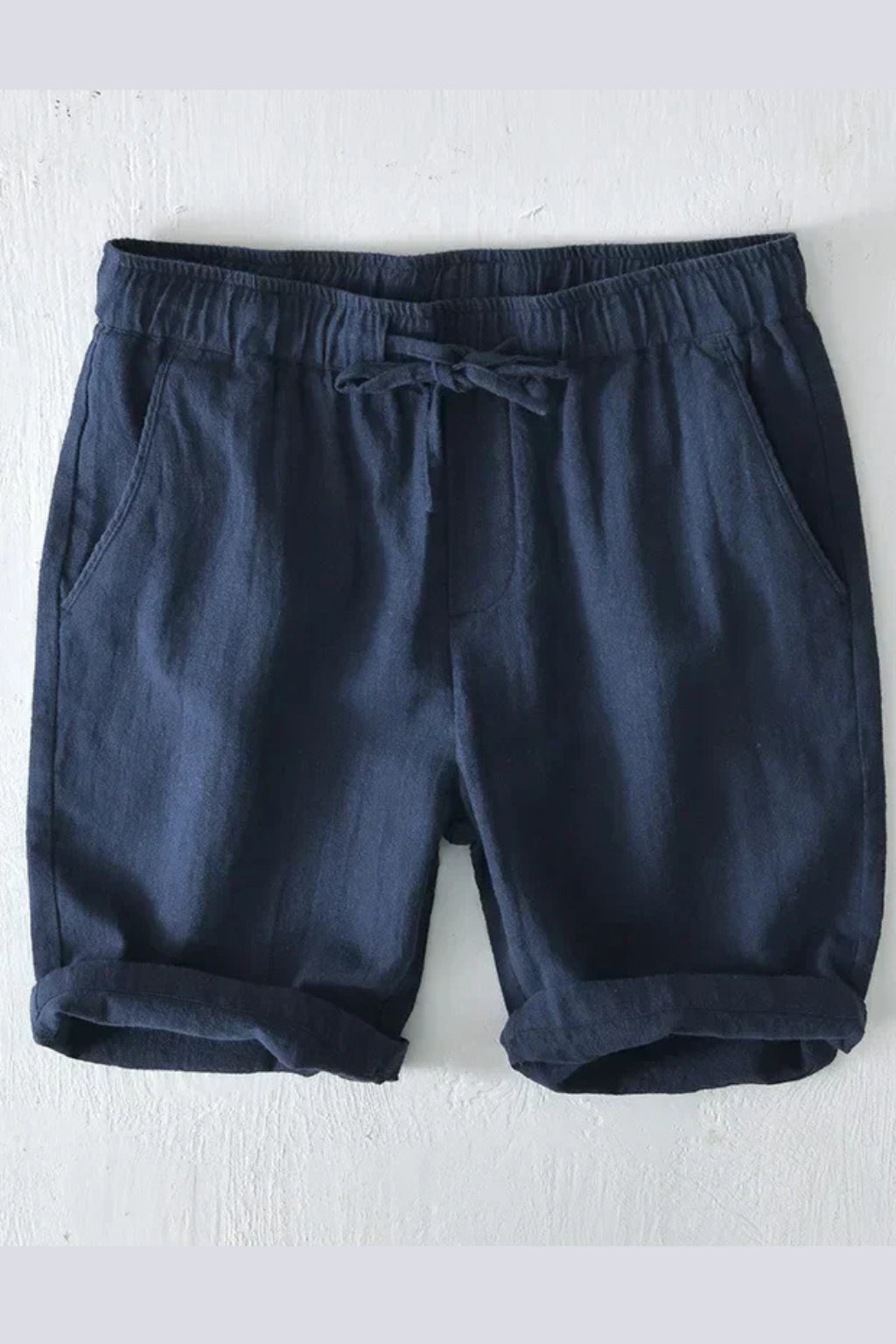 Model wearing shorts with casual styling, lifestyle shot