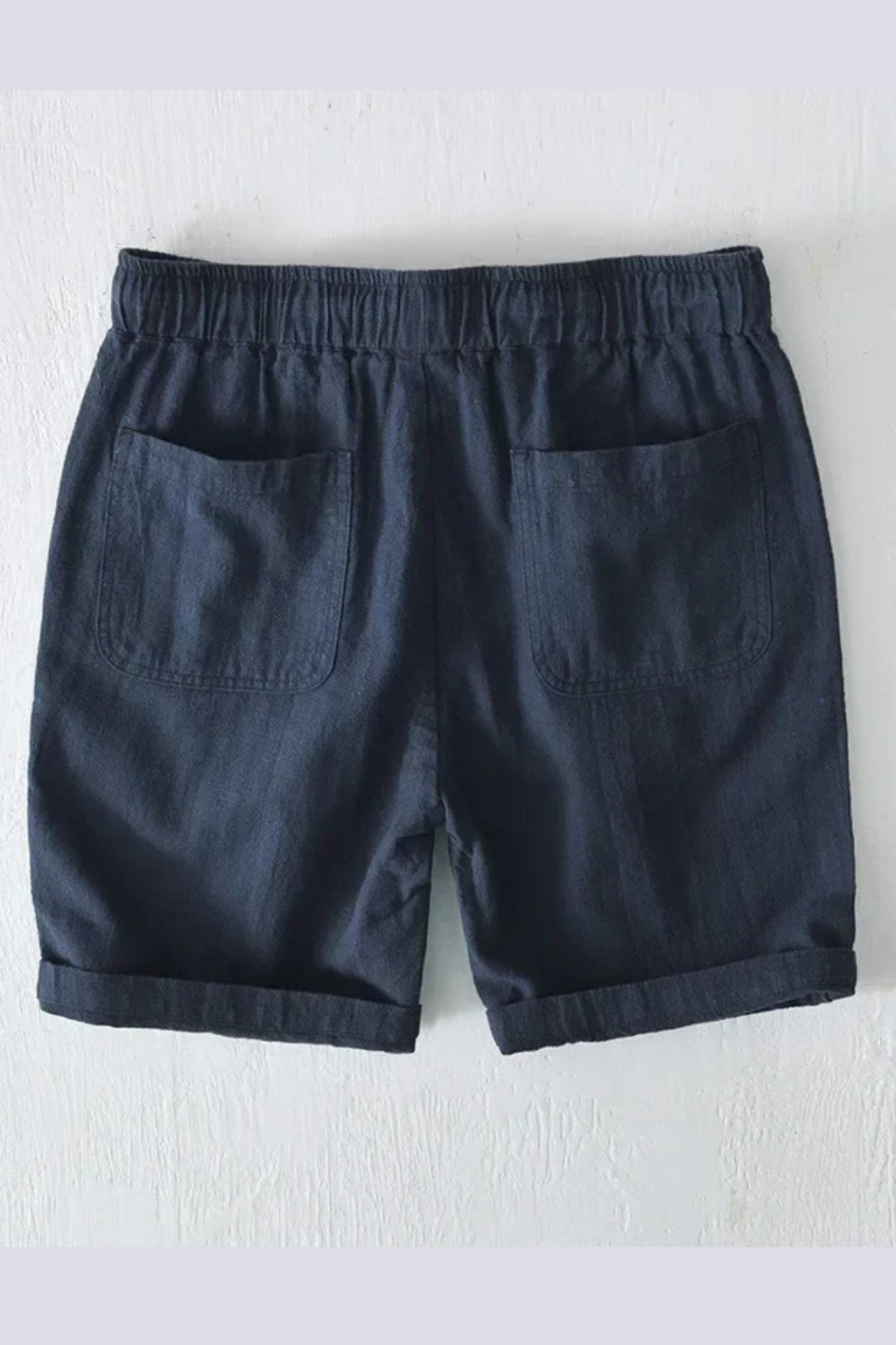 Back hip pocket and seam detail on shorts
