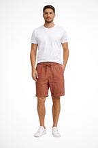 Men's linen drawstring shorts in relaxed fit, displayed flat lay