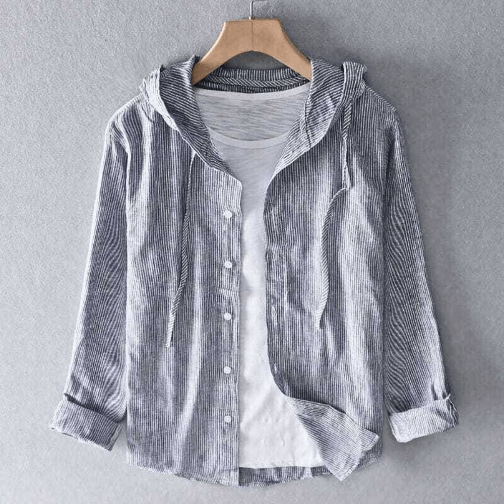 Model wearing shirt layered over casual tee