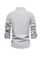 Sleeve detail showing cuff and button closure