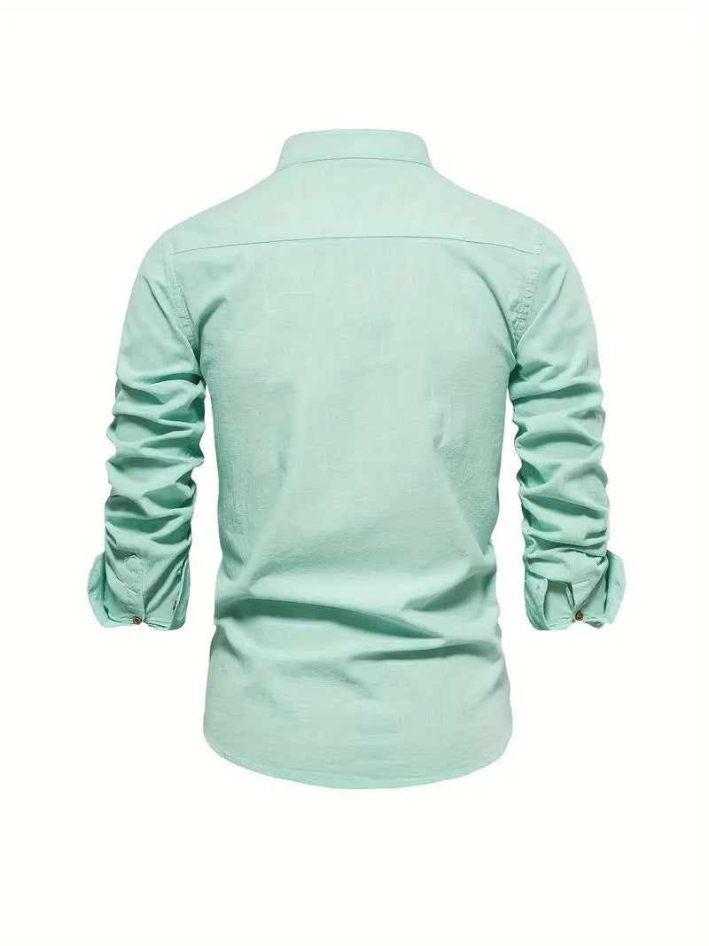 Side profile of model wearing long sleeve embroidered shirt
