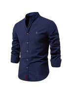 Shirt collar and button detail, flat lay