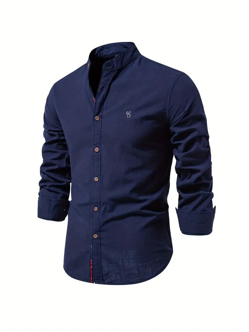 Shirt collar and button detail, flat lay