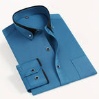 Close-up of black contrast collar detail on white shirt