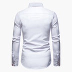 Model wearing white paisley trim shirt, standing pose with hands relaxed