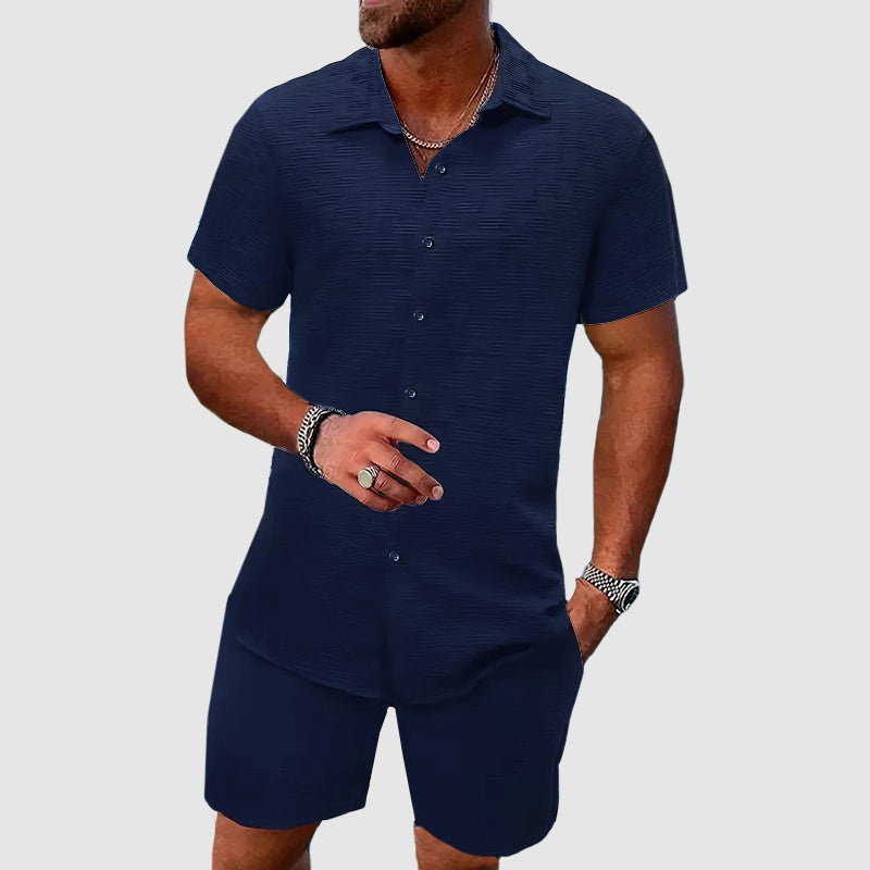 Side view of man in white geometric weave shirt