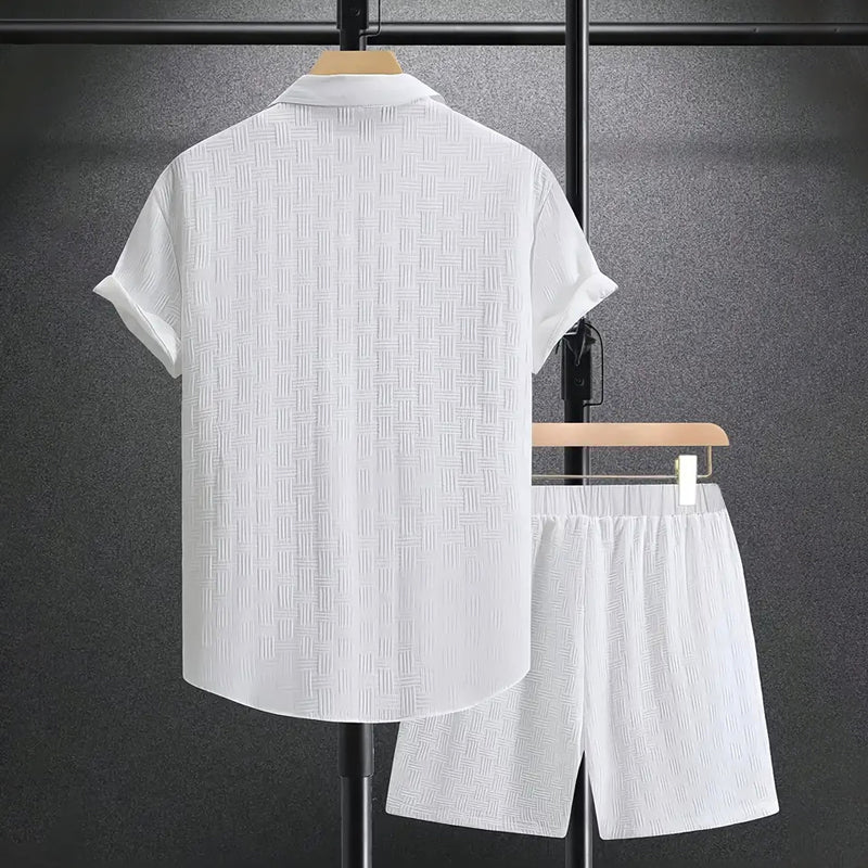 Neckline and button front detail of white collar shirt