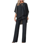 Close-up of batwing sleeve detail and shimmering chiffon fabric