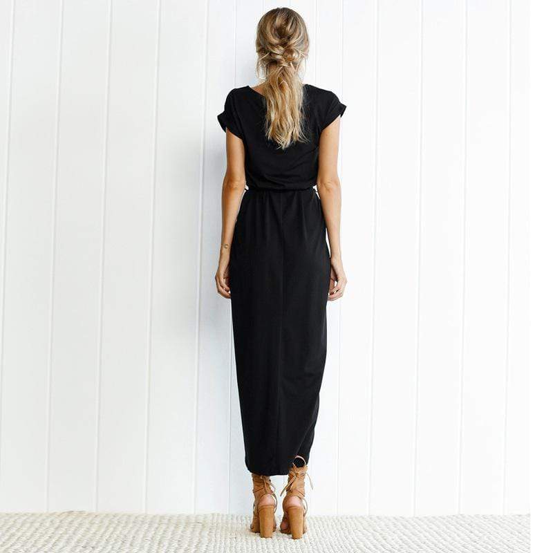 Detail shot of round neckline and short sleeve on navy wrap dress