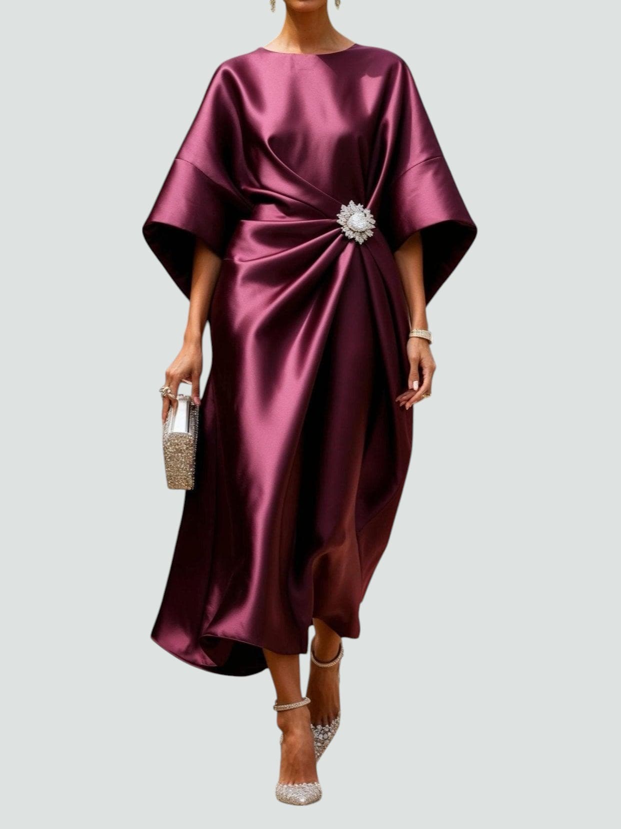 Model wearing navy kimono sleeve dress, standing pose showing draping detail