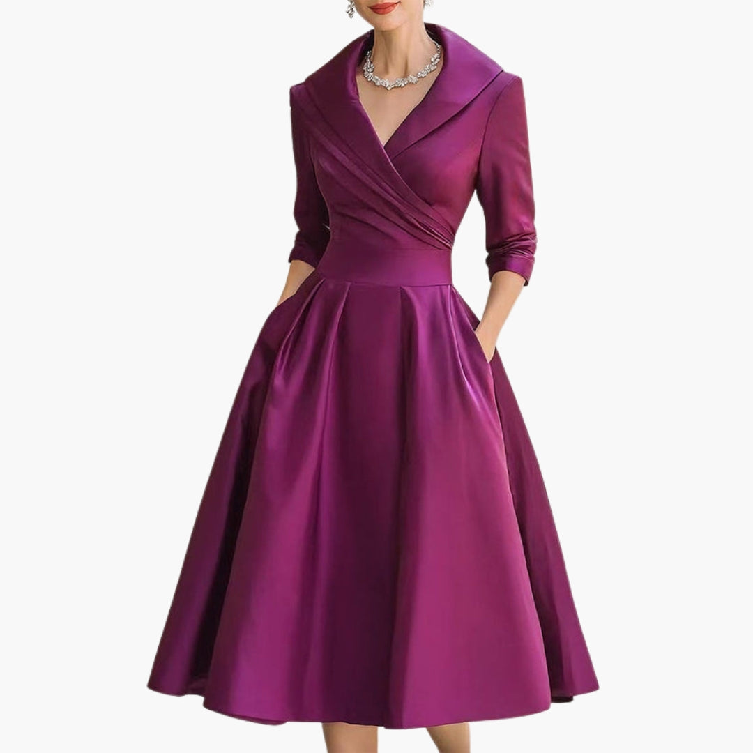 Rear view of midi dress showing draped back and sleeve detail