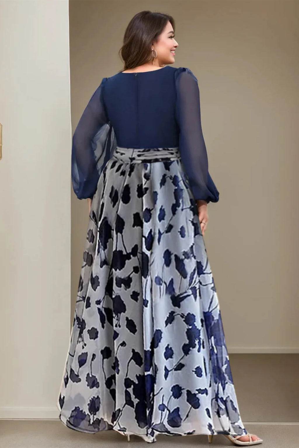 Side profile of dress highlighting fitted bodice and waist embellishment