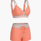 Close-up detail of halter neckline and adjustable straps on bikini top