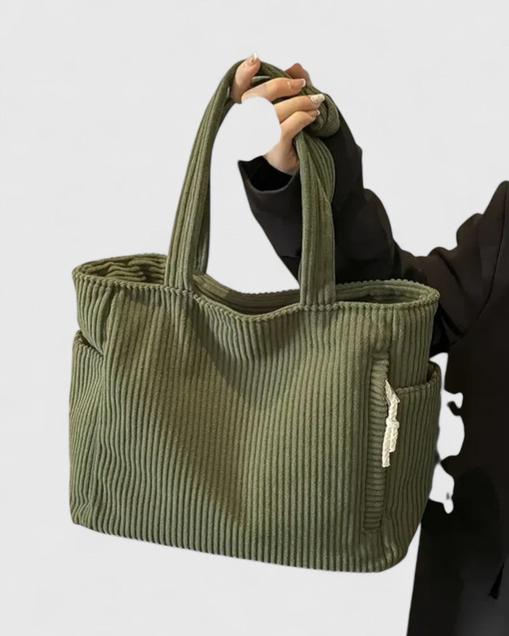 Olive green corduroy tote bag displayed front-on showing full silhouette