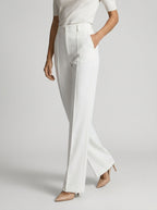 Pantalon large taille haute avec plis blanc pour femme