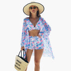 Longline floral cover-up draped over shoulder, full-length view