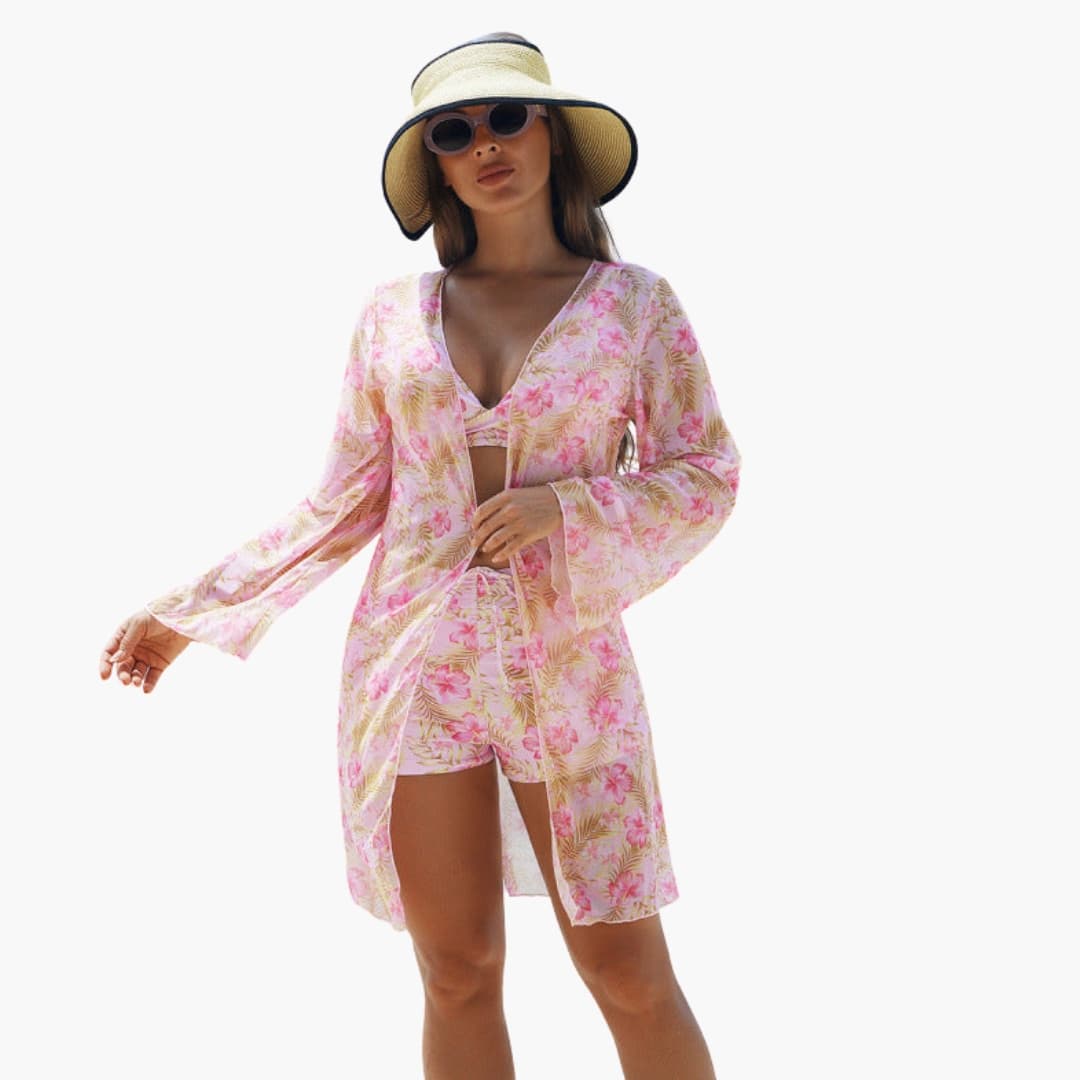 Women's floral bikini set with pink and gold print, padded top and matching cover-up