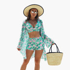 Mid-rise bikini bottoms with coordinating pink and gold floral print detail