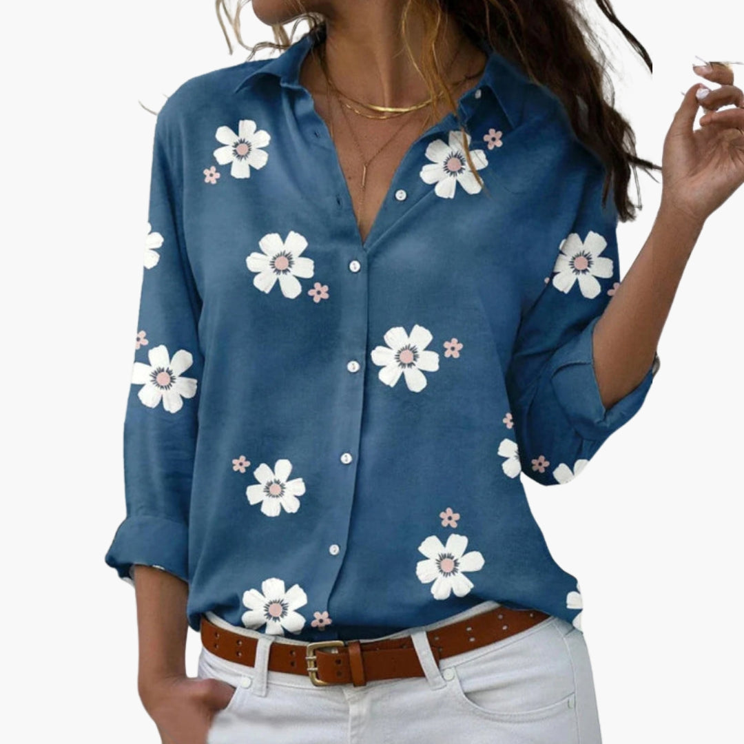 Close-up detail of white daisy motif and fabric texture