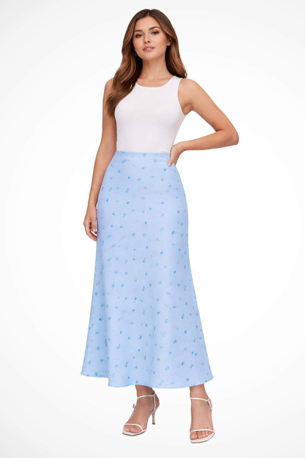 Model in maxi skirt walking, showcasing movement and grace