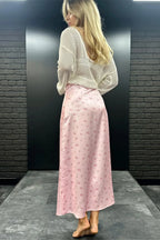 Back view of maxi skirt showing flowing A-line construction